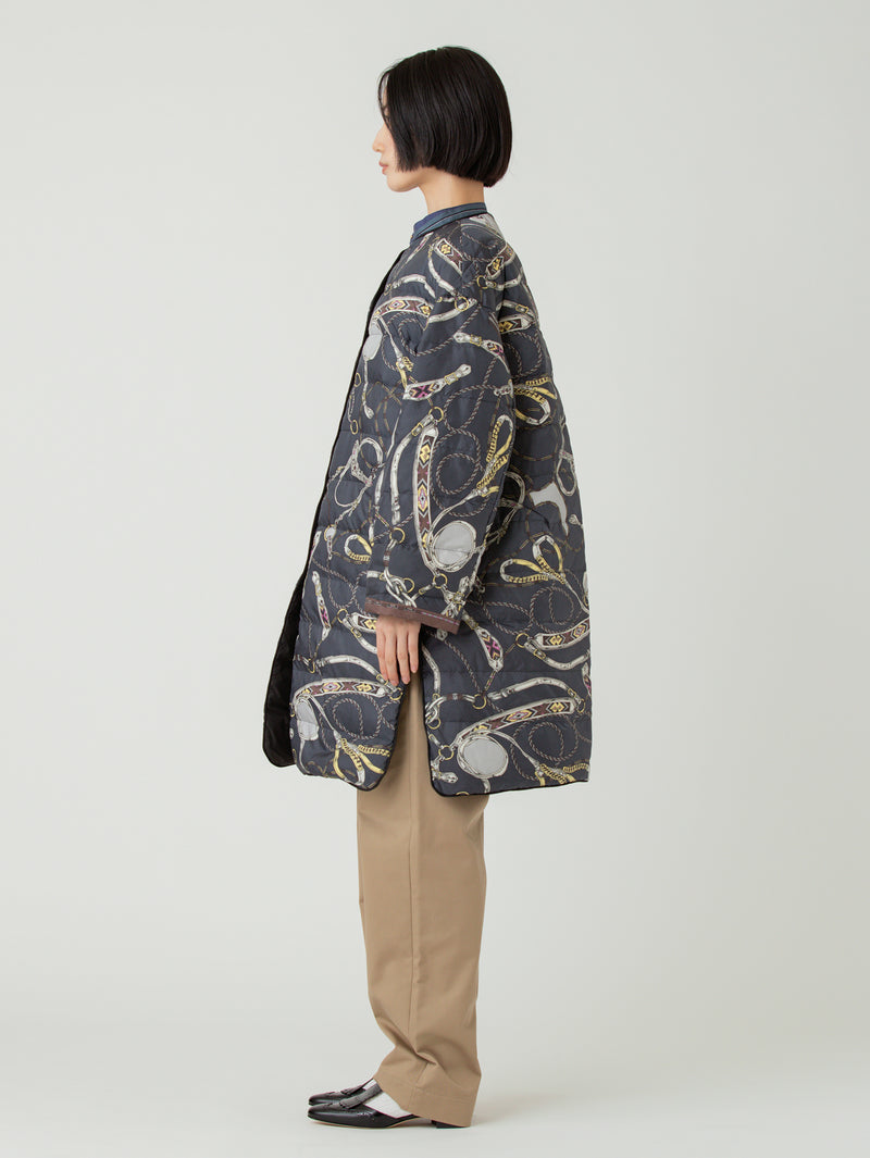 DOWN LONG COAT / REVERSIBLE NATIVE BIT